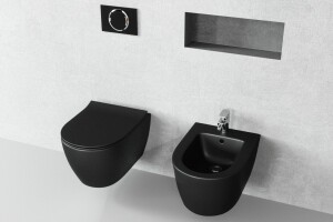 WC und ein Bidet in schwarz mit dr&uuml;cker platte Rund